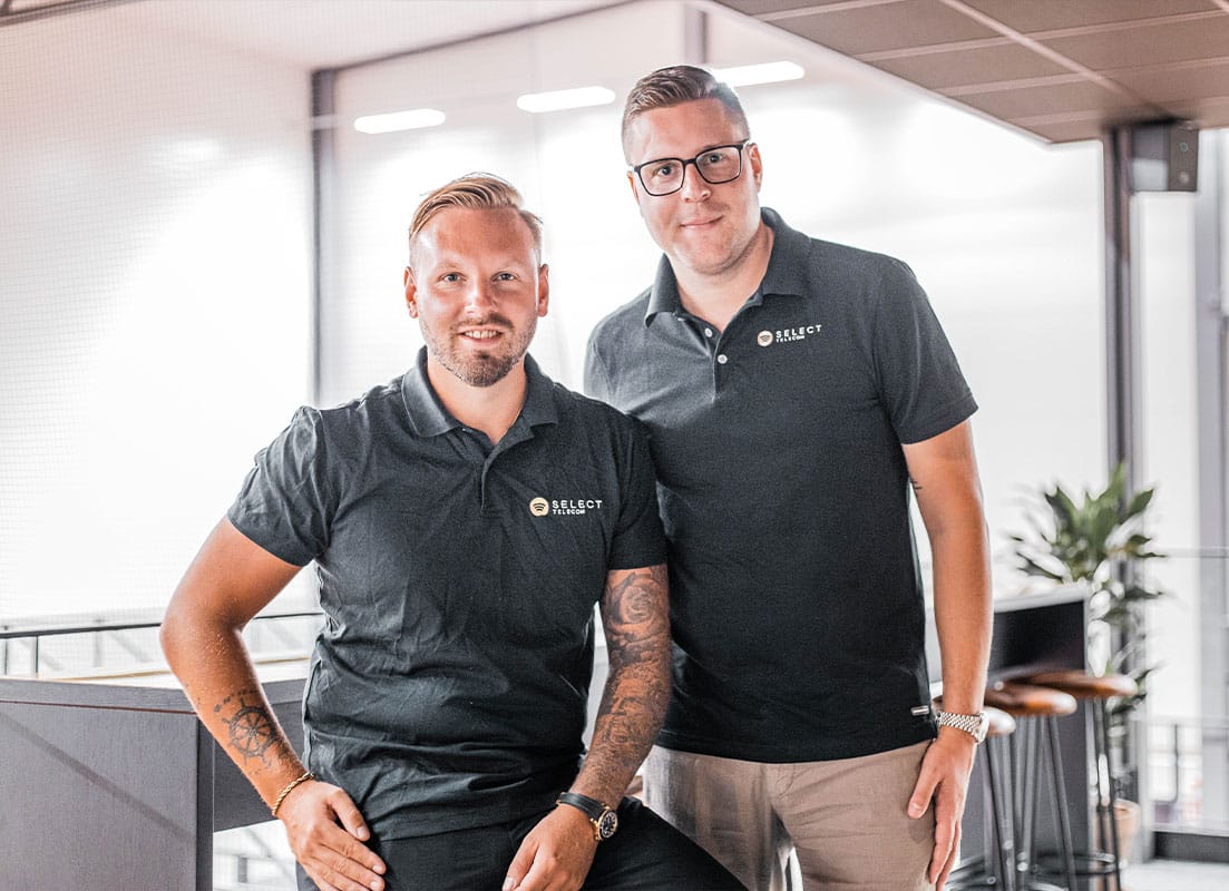 2 guys in black shirts