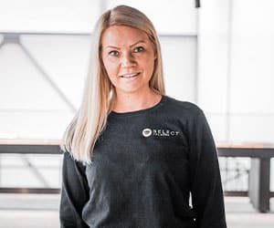 Blonde woman in black shirt