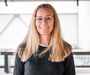 Blonde woman in black shirt